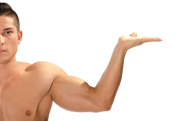 あなたのプロダクトを示す筋肉の男 — ストック写真