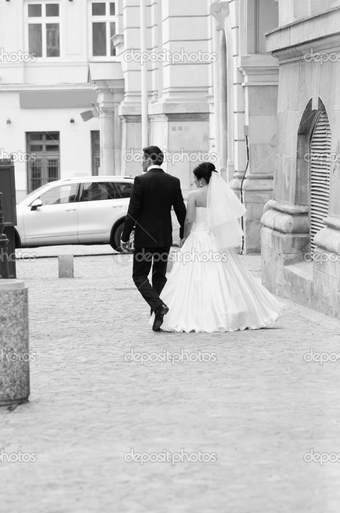 Newlyweds leaving the town square