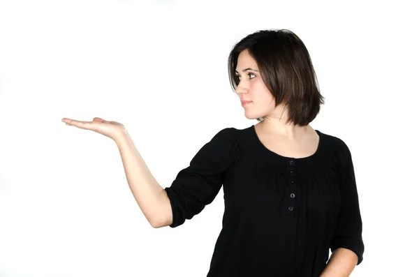 Portrait of young woman showing your product — Stock Photo, Image