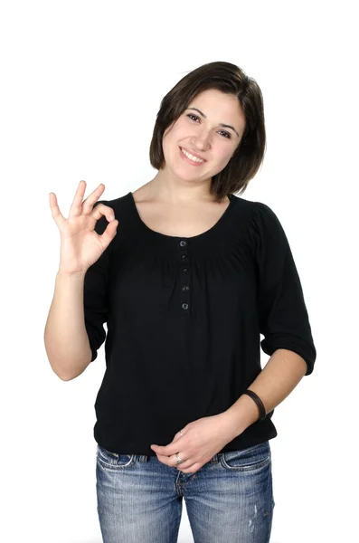 Portrait of young woman showing ok sign — Stock Photo, Image