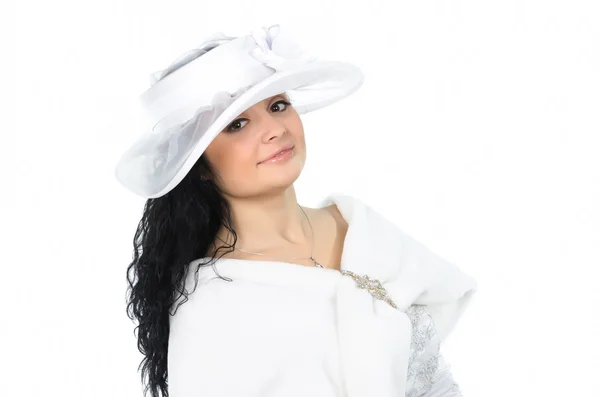 Beautiful bride with hat and cape — Stock Photo, Image