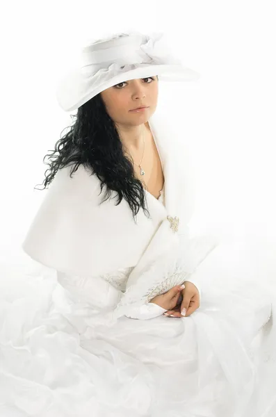 Beautiful bride with white hat, fan and white cape — Stock Photo, Image