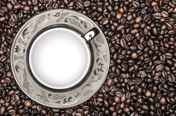 Taza vacía de café y granos de café — Foto de Stock