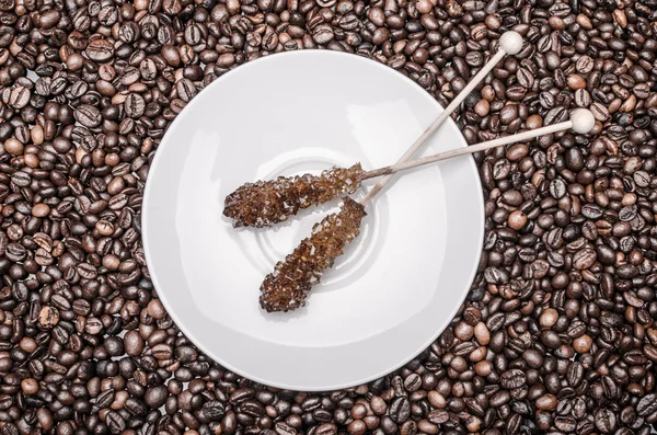 Granos de café y piruleta — Foto de Stock
