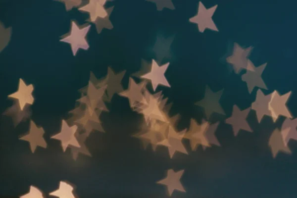 Goldene Sterne Leuchten Bokeh Hintergrund Abstraktes Weihnachtsmuster — Stockfoto