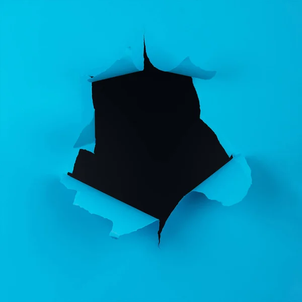 Abstrakter Hintergrund Eines Schwarzen Lochs Zerrissener Blauer Papieroberfläche Mit Kopierraum — Stockfoto