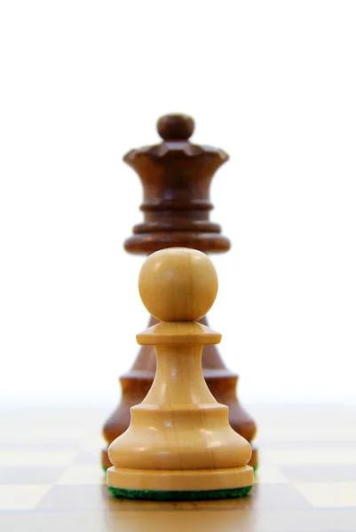 Pawn and queen — Stock Photo, Image