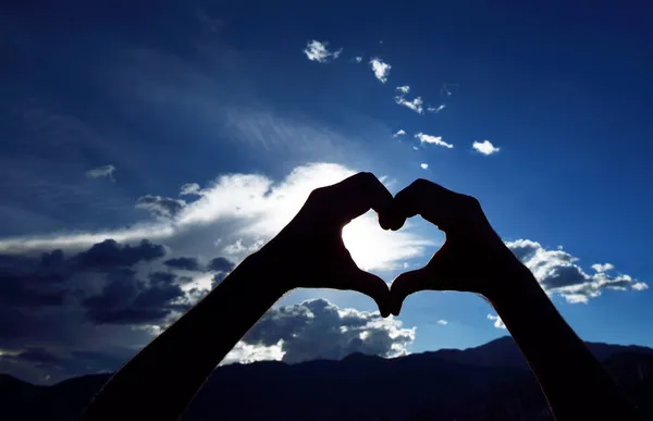 Símbolo del corazón, amor con las manos Imagen De Stock