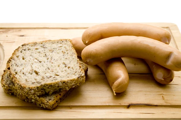 Rohe Wurst mit Brot — Stockfoto