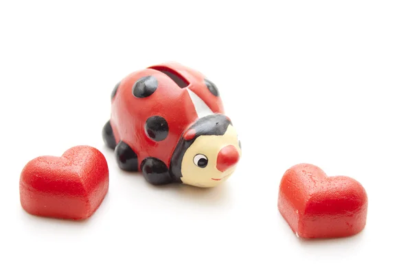 Ladybird with red hearts — Stock Photo, Image