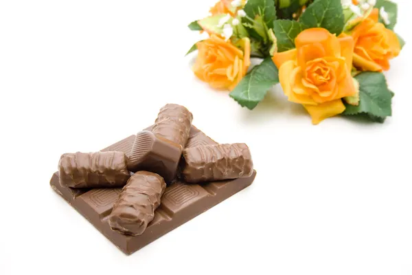 Choklad med blomma — Stockfoto