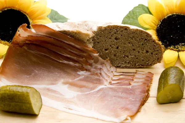 Ham bacon with cucumber — Stock Photo, Image