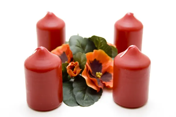 Vosková svíčka s květinou — Stock fotografie