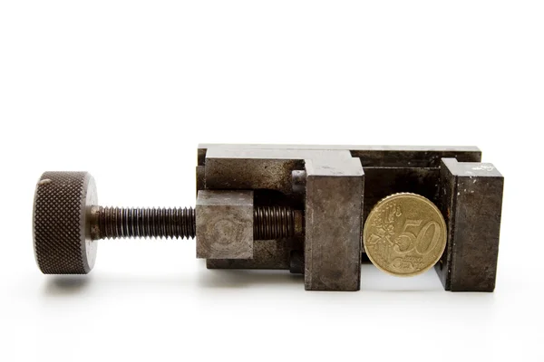 Maquinista vise con moneda de dinero —  Fotos de Stock
