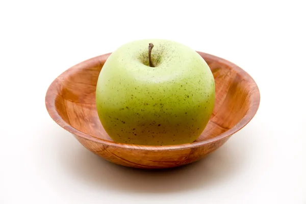 Green Apple in brown bowl — Stock Photo, Image