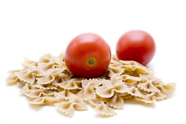 Red Tomatos in noodles — Stock Photo, Image