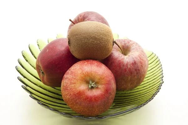 Red Apples in green bowl — Stock Photo, Image