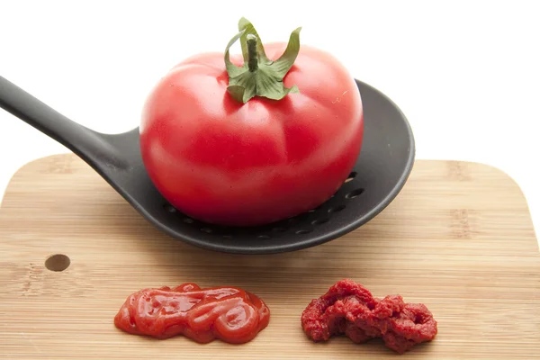Tomat på skimmer — Stockfoto