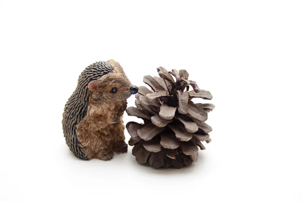 Pine plugs with hedgehog — Stock Photo, Image