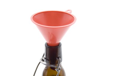 Funnel in glass bottle