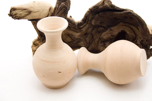 Stone vase with wooden root — Stock Photo, Image