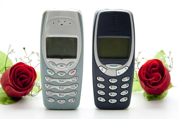 Mobile phone with rose — Stock Photo, Image