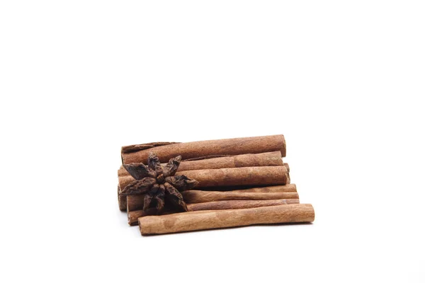 Cinnamon stars and cinnamon sticks — Stock Photo, Image