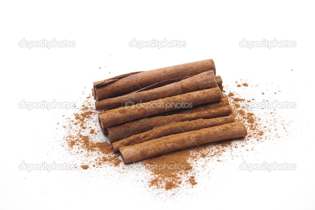 Cinnamon sticks with cinnamon powder