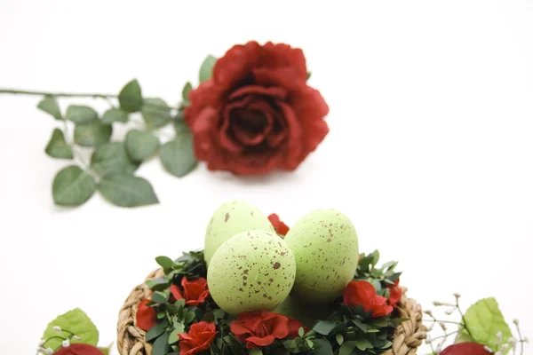 Easter eggs in the flower arrangement — Stock Photo, Image