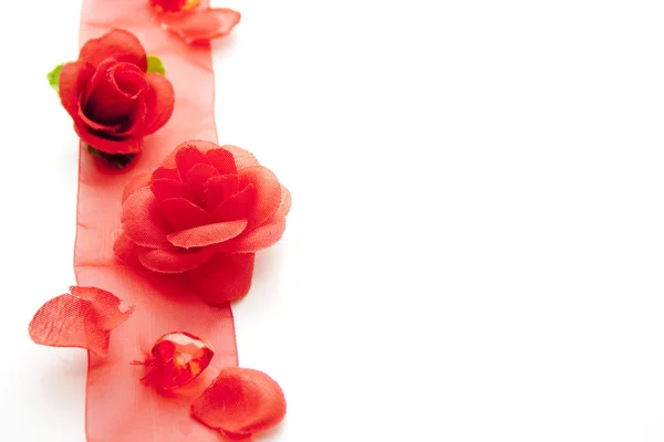 Silk tape with roses Royalty Free Stock Photos