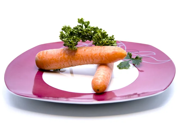 Carrots and parsley on plate — Stock Photo, Image
