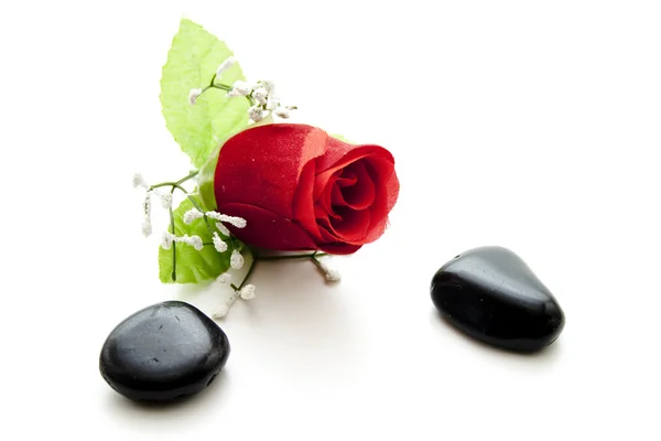 Red rose with stones Stock Photo