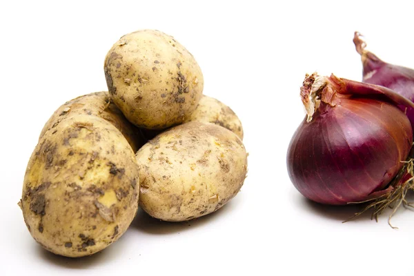 Fresh food potatoes with red onions — Stock Photo, Image