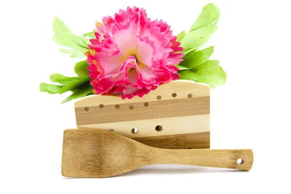 Rascador de madera con flor —  Fotos de Stock