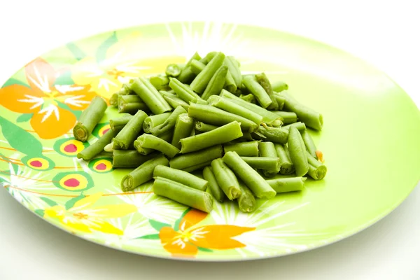 Frijoles verdes en plato — Foto de Stock