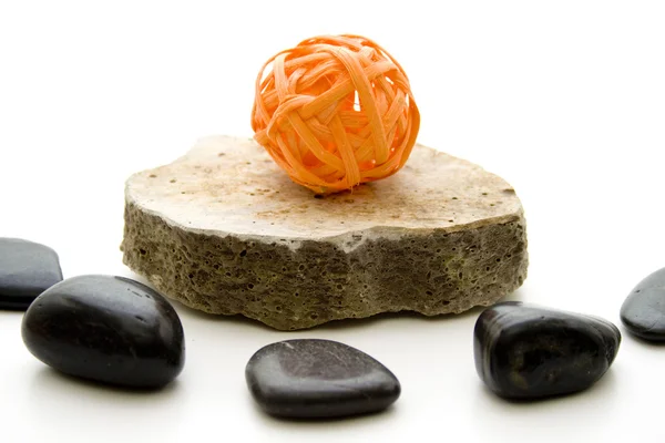 Stones with wooden balls — Stock Photo, Image