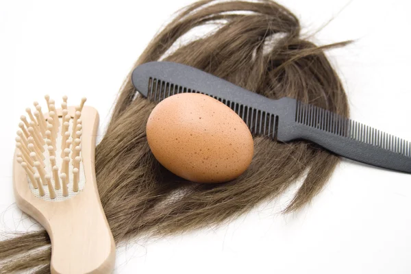 Hairbrush with hairpiece Stock Photo