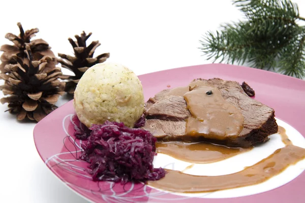 Pigs roast with red cabbage — Stock Photo, Image