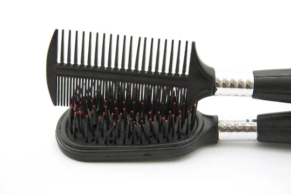 Hairbrush and comb — Stock Photo, Image