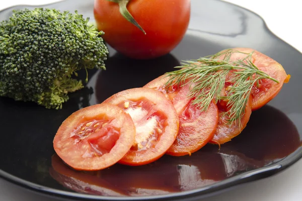 Tomato with broccoli — Stock Photo, Image