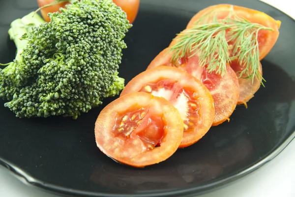 Tomato with broccoli — Stock Photo, Image