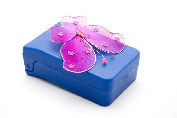 Butterfly on plastic box — Stock Photo, Image