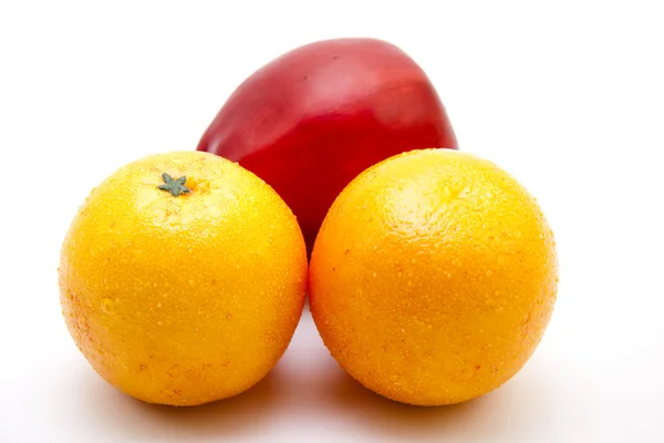Oranges with apple — Stock Photo, Image