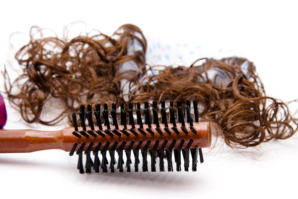 Kartáč na vlasy s vlasy zámky a okolí — Stock fotografie