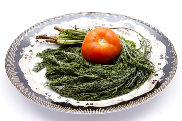 Tomato with dill — Stock Photo, Image