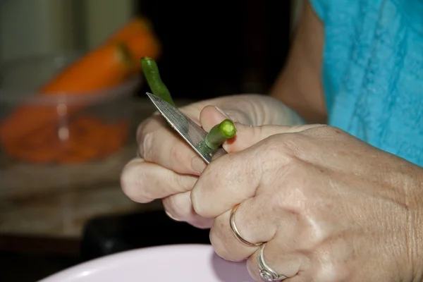 Stick beans in the hand — Stock Photo, Image