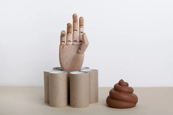 Empty Toilet Paper Rolls Wooden Hand Poop Concept — Foto de Stock