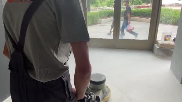 Floor grinding for decorative microcement finishing — стоковое видео