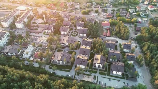 Aerial view of a residential area in the forest. 4k video drone footage — Wideo stockowe