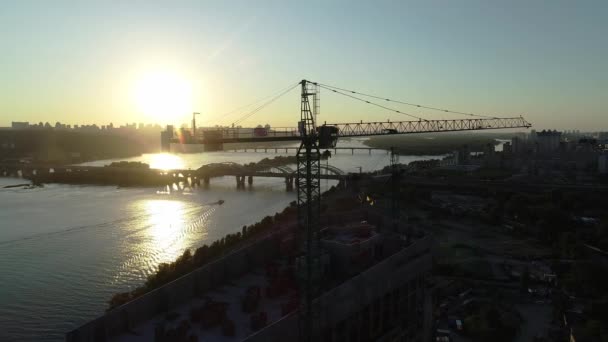 Aerial view of the construction of a new modern residential complex near the river, Kyiv, Ukraine — Video